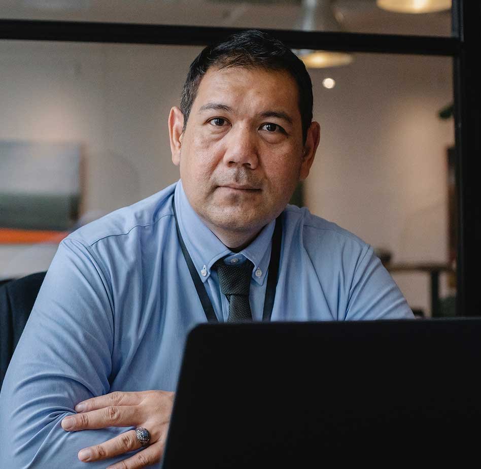 Man Working behind Laptop Man Working behind Laptop